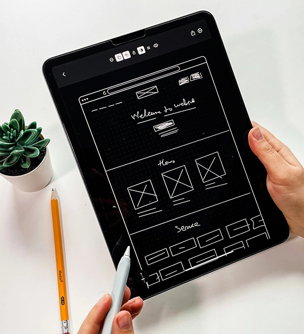Web app development company in India, sketching website wireframe